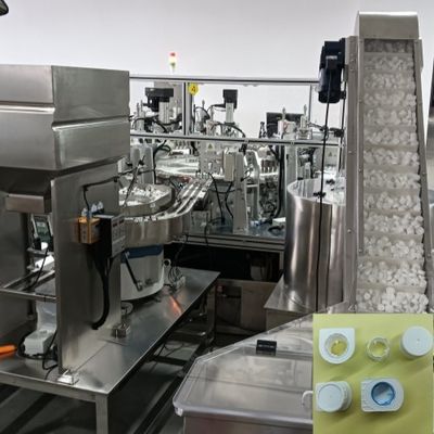 Un buen precio. 10 cavidades de detección automática de acero inoxidable y aleación de aluminio de helio máquina de montaje de tapa de leche en línea