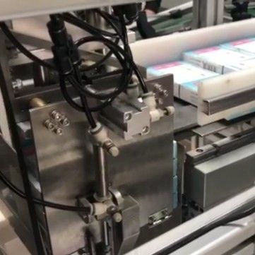 Un buen precio. Máquina de embalaje automática de ojos ópticos AC380V Máquina de embalaje automática en línea