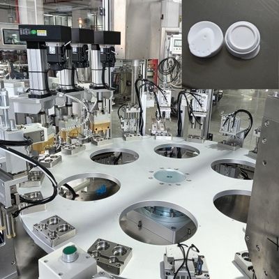 Máquina de ensamblaje de tapas de desecante con una tasa de satisfacción del 99%, control PLC y detección de sensores fotoeléctricos